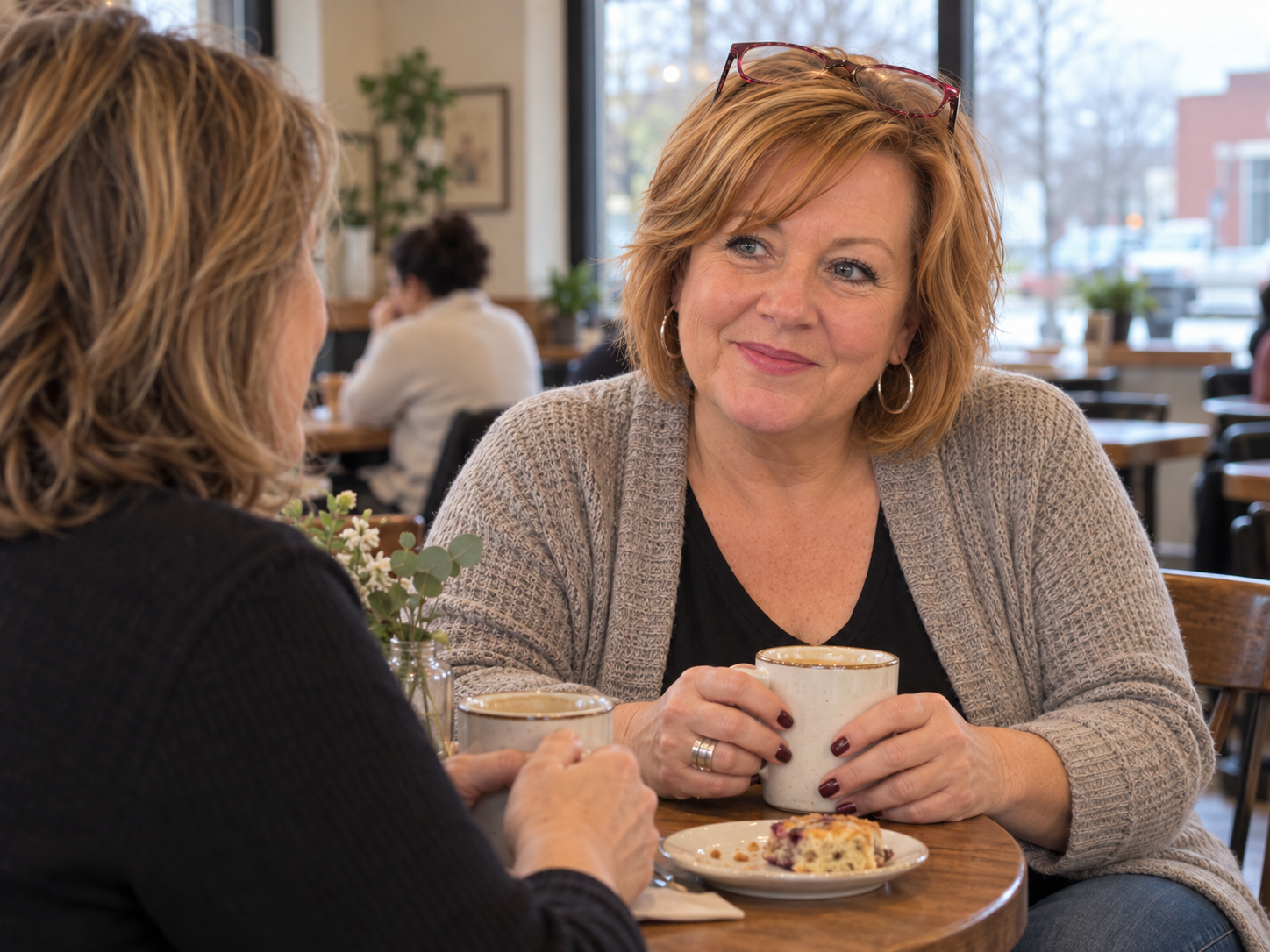 Marcia having coffee with a friend