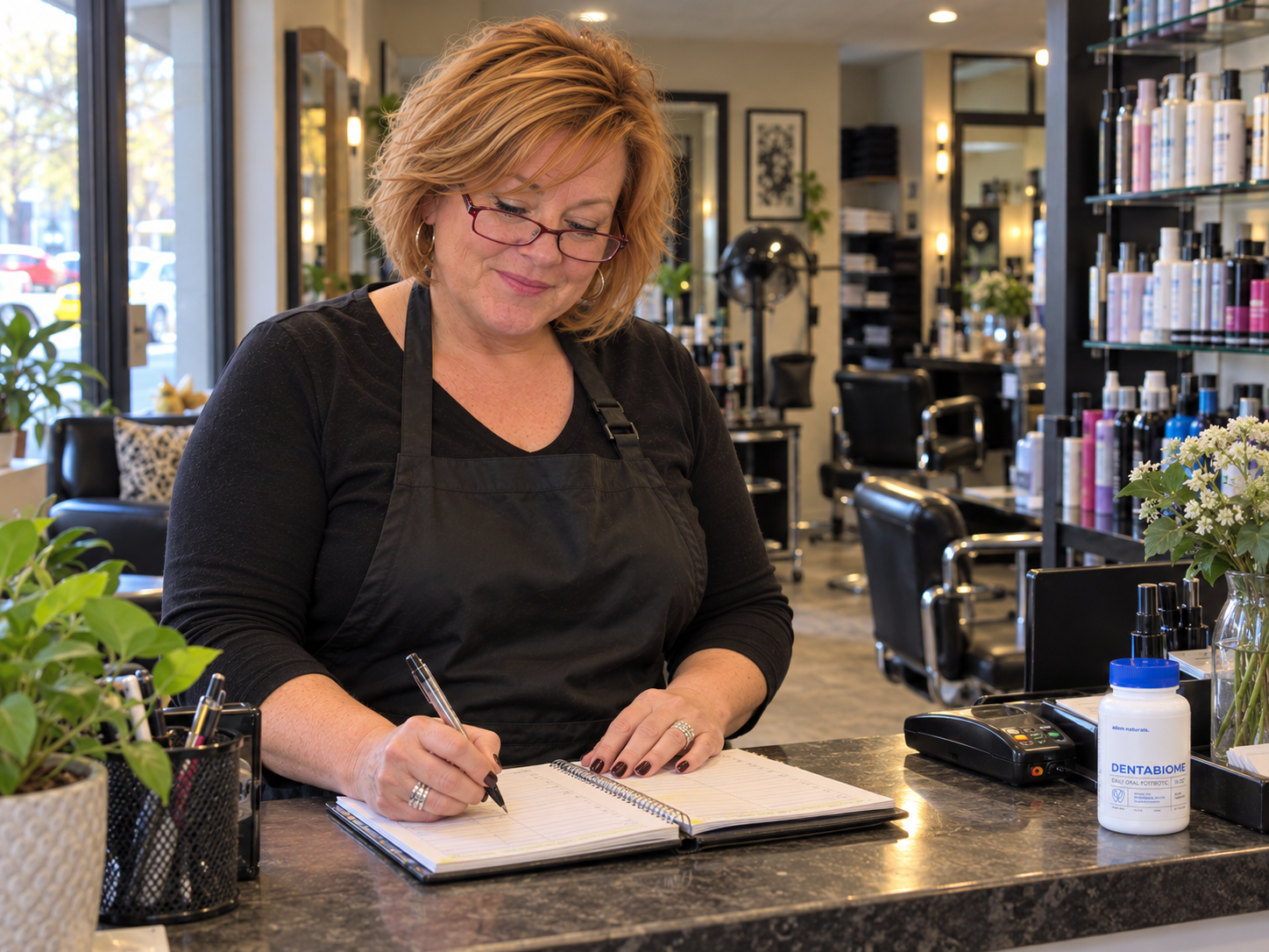 Marcia at the salon reception desk